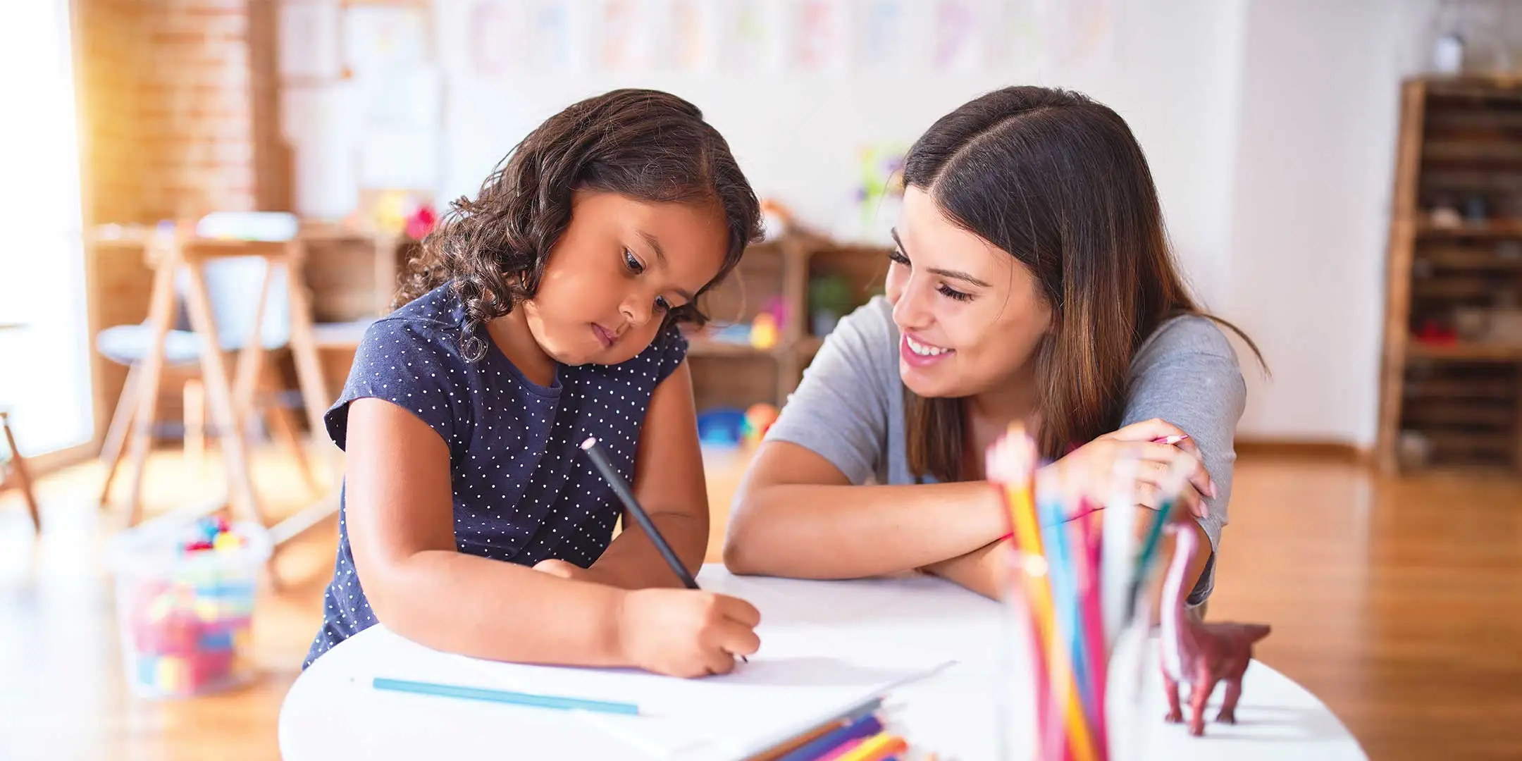 child and teacher